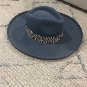 Stylish Blue Fedora Hat with Patterned Band